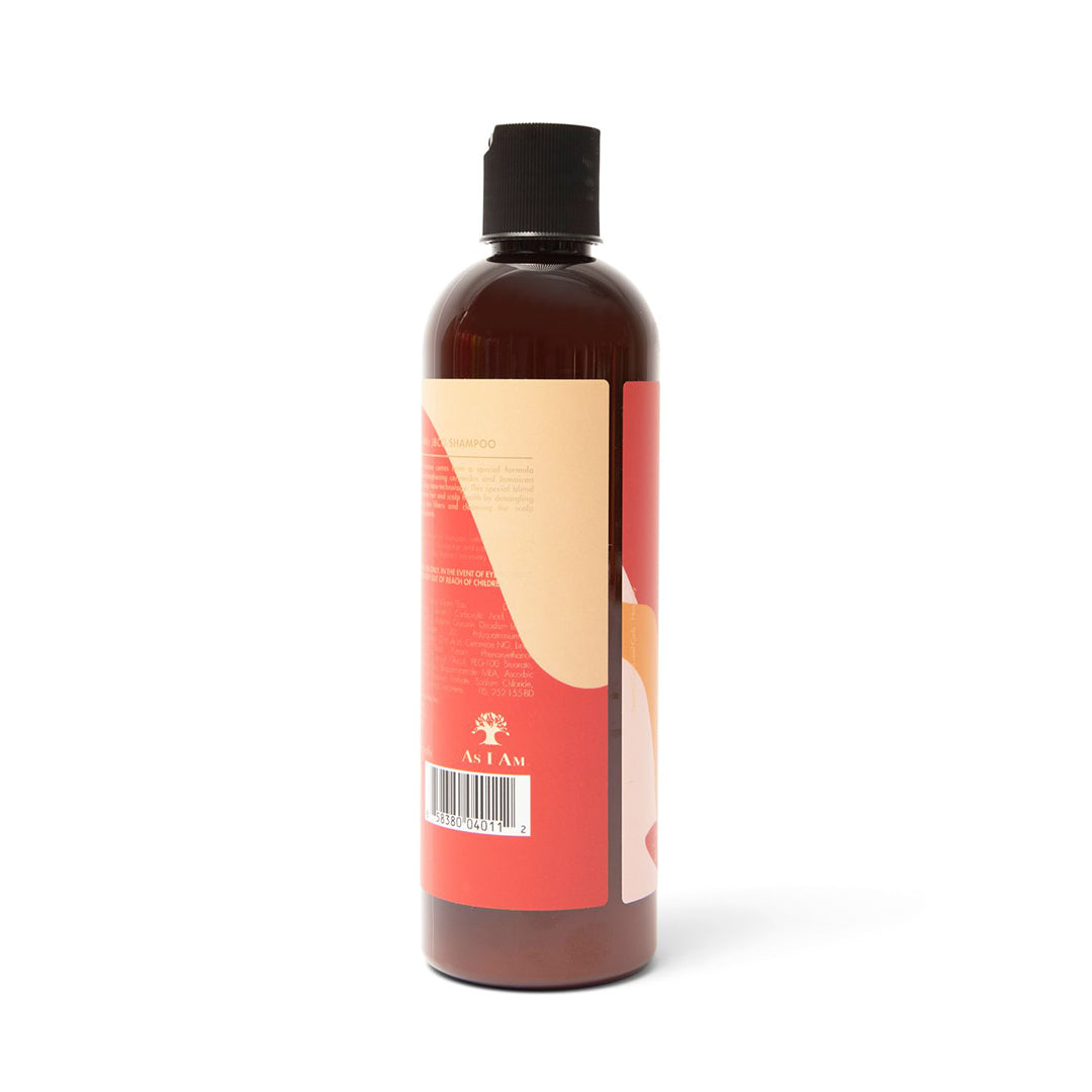 As I Am Jamaican Black Castor Oil Shampoo 355ml. En brun plastikflaske med en sort skruekappe. Siden af flasken viser produktinformation og ingredienser.