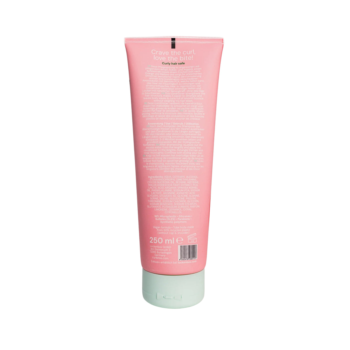 Bagside af Curl Bites conditioner-tube, 250 ml, i lyserødt design med lysegrøn skruelåg og produktinformation.